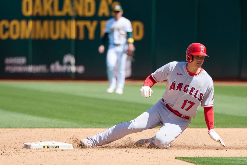 Los Angeles Angels designated hitter Shohei Ohtani steals second base against the Oakland Athletics during the fifth inning at Oakland-Alameda County Coliseum in Oakland, California, on Sept. 3. 