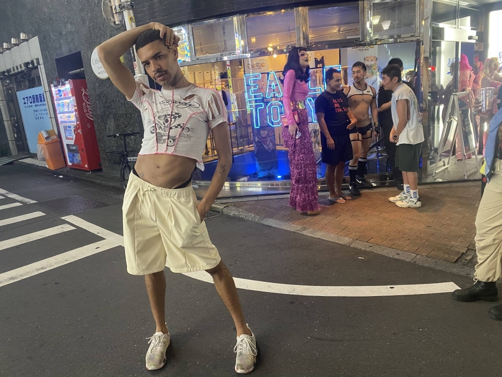 Yvie Oddly poses in front of Eagle Tokyo Blue, a Ni-chome bar instrumental in organizing many events around the Japan visits of "RuPaul's Drag Race" stars.