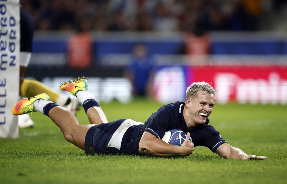Scotland's Darcy Graham scores a try against Romania in their Rugby World Cup Pool B match in Lille, France, on Saturday.