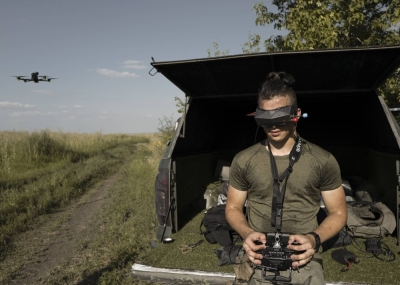 A Ukrainian drone pilot, call sign Darwin, operating a first-person-view, or FPV, drone on a test flight near Kupiansk, Ukraine, on Aug. 5.