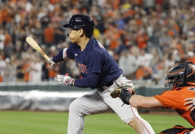Masataka Yoshida hits a ninth-inning double for the Red Sox against the Orioles in Baltimore, Maryland, on Saturday.