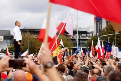 Polish opposition leader, former premier and head of the centrist Civic Coalition bloc, Donald Tusk addresses participants of a rally in Warsaw on Sunday.