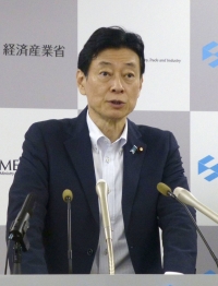 Industry minister Yasutoshi Nishimura announced Japan's additional subsidies for U.S. chipmaker Micron Technology's plant in Hiroshima Prefecture. | Kyodo