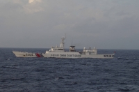 A China coast guard vessel sails in the East China Sea near the disputed Senkaku Islands in December 2015. | Japan Coast Guard / via Reuters