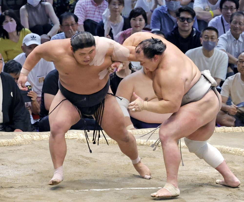 Hakuoho's (left) impressive performance at the Nagoya Grand Sumo Tournament saw him nearly win the Emperor's Cup in his top-division debut.