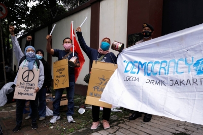 People protest outside Myanmar's embassy in Jakarta in February 2021.