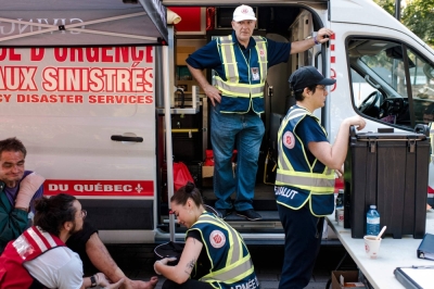 Volunteers work at a Salvation Army mobile health clinic in Montreal on Sept. 22. Canada, despite being a wealthy nation, is gripped by a surge in homelessness that has seen thousands of people living in the streets after being priced out of real estate and rental markets.