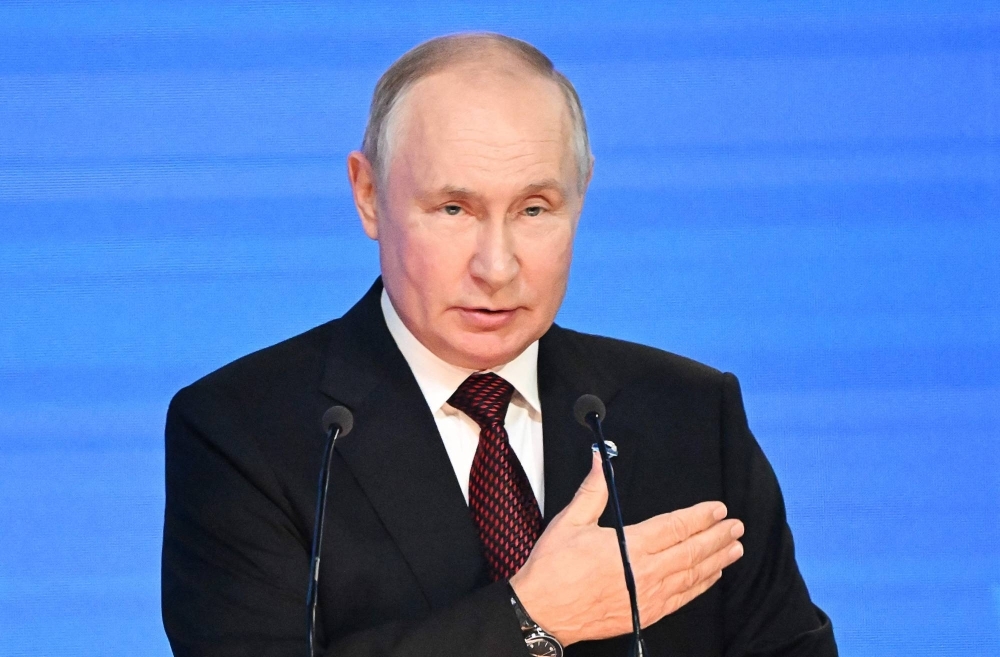Russian President Vladimir Putin addresses the plenary session of the Valdai Discussion Club forum in Sochi, Russia, on Thursday.