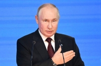 Russian President Vladimir Putin addresses the plenary session of the Valdai Discussion Club forum in Sochi, Russia, on Thursday. | POOL / via AFP-Jiji