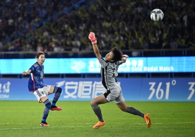 Japan's Yoshino Nakashima scores a goal during the team's victory over North Korea on Friday in the gold medal match at the Asian Games in Hangzhou, China.