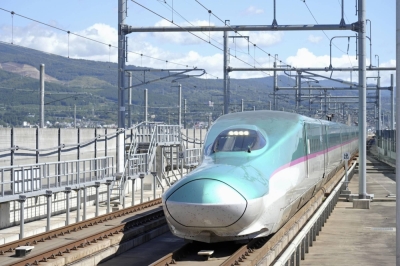 A Hokkaido Shinkansen line bullet train travels through Hokuto, Hokkaido, in September.