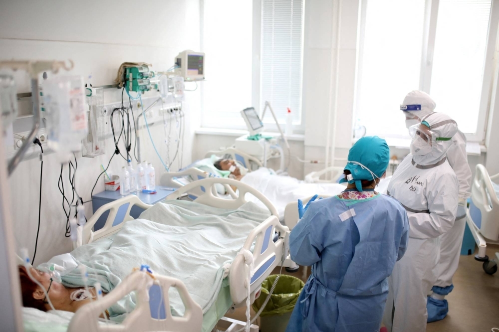 Medics tend to COVID-19 patients at the intensive care unit of a hospital in Sofia, Bulgaria, in 2022. 