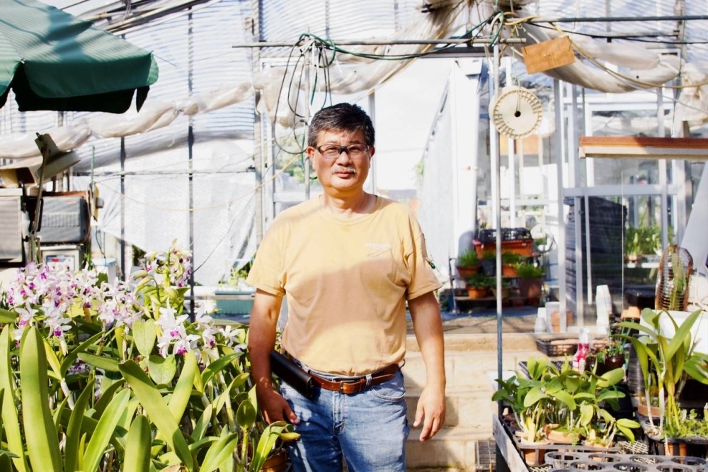 Third-generation orchid farmer and Japan Orchid Growers Association President Munekazu Eriji is passionate about the plant.