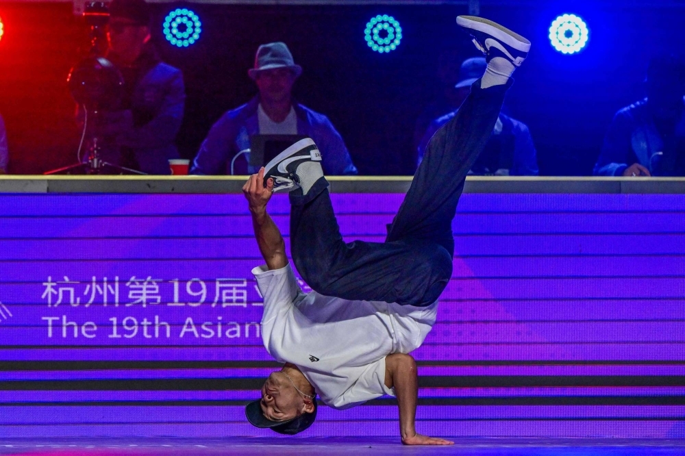 Shigeyuki "Shigekix" Nakarai competes in the final of the Asian Games men's breakdancing competition in Hangzhou, China, on Saturday.