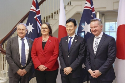 Economy, Trade and Industry Minister Yasutoshi Nishimura (second from right) meets with Australian Trade Minister Don Farrell (left), Resources Minister Madeleine King (second from left), and Climate and Energy Minister Chris Bowen in Melbourne on Sunday.