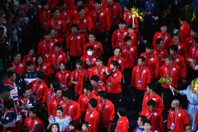 Japan's athletes participate in the closing ceremony of the Asian Games in Hangzhou, China, on Sunday.