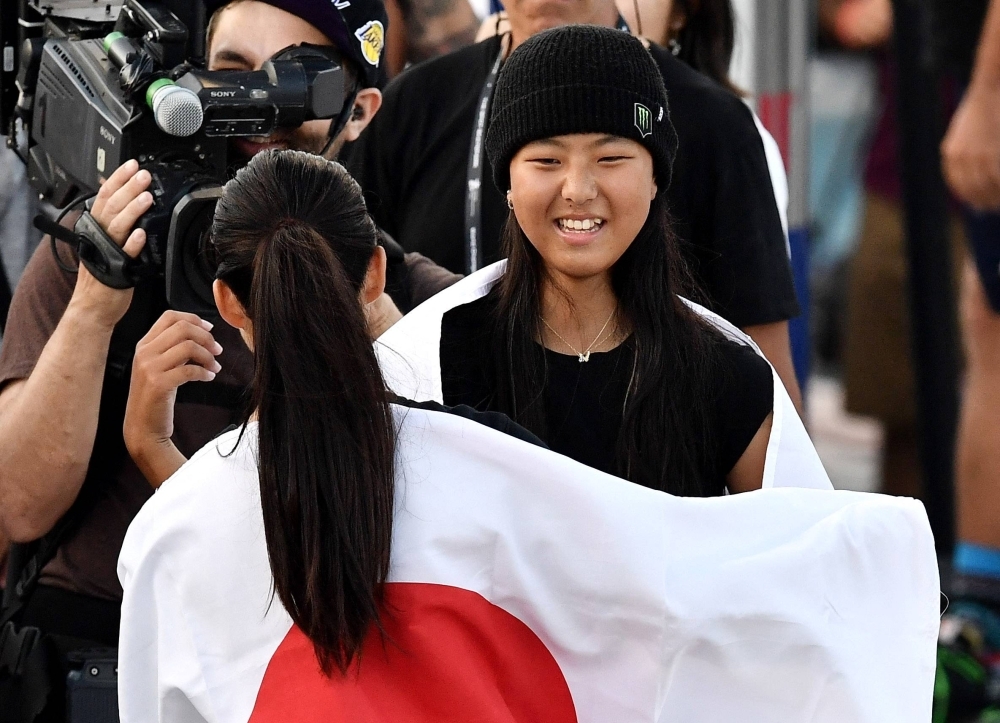 Kokona Hiraki (right) celebrates with Hinano Kusaki after the women's final at the World Skate Park World Championships in Rome on Sunday.