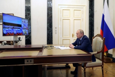 Russian President Vladimir Putin watches a test launch of the Sarmat intercontinental ballistic missile at Plesetsk cosmodrome via video link in Moscow on April 20.