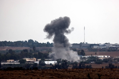 A rocket launched from the Gaza Strip strikes an area near Sderot, southern Israel, on Monday.