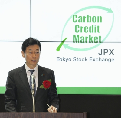 Trade minister Yasutoshi Nishimura speaks at a ceremony at the Tokyo Stock Exchange on Wednesday to launch a new platform for the trade of carbon credits. 