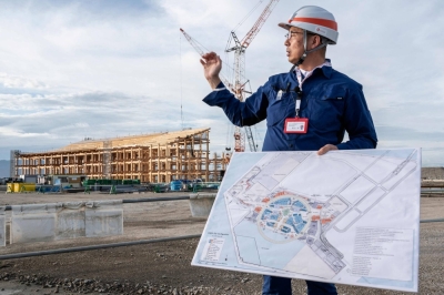 An official speaks during a government-sponsored tour of the 2025 Osaka Expo site on Yumeshima island, Osaka, on Sept. 14.