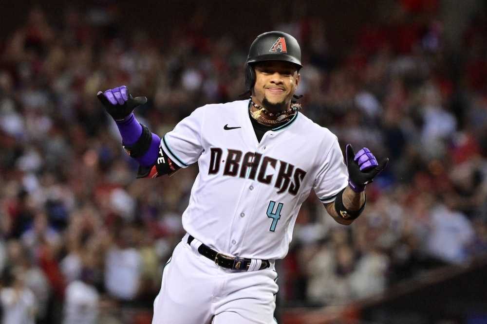 The Diamondbacks' Ketel Marte reacts after hitting a home run against the Dodgers in the third inning of the NLDS in Phoenix, Arizona, on Wednesday.