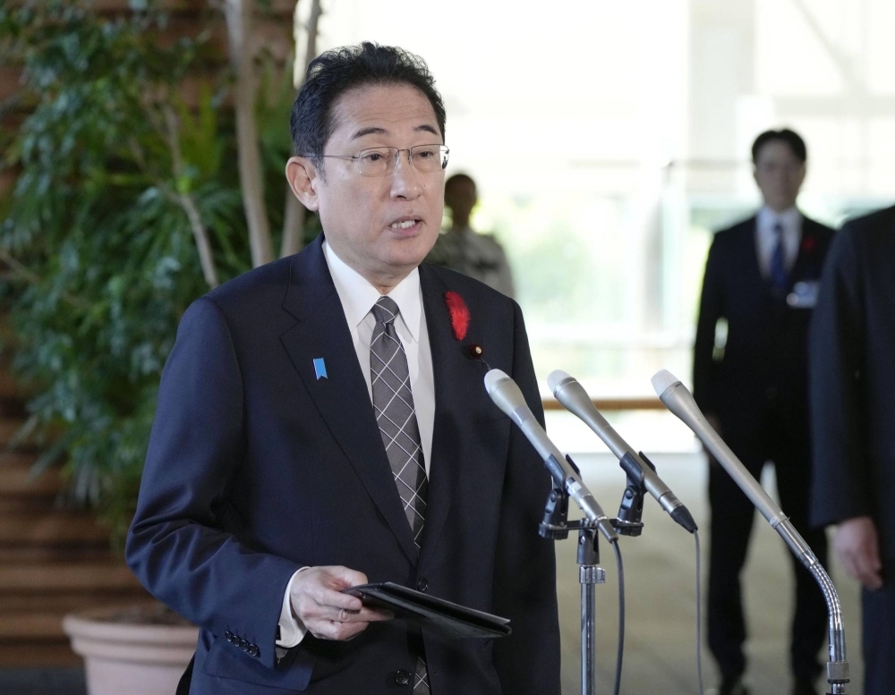 Prime Minister Fumio Kishida speaks to reporters on Thursday at Prime Minister's Office in Tokyo.