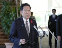 Prime Minister Fumio Kishida speaks to reporters on Thursday at Prime Minister's Office in Tokyo. | KYODO