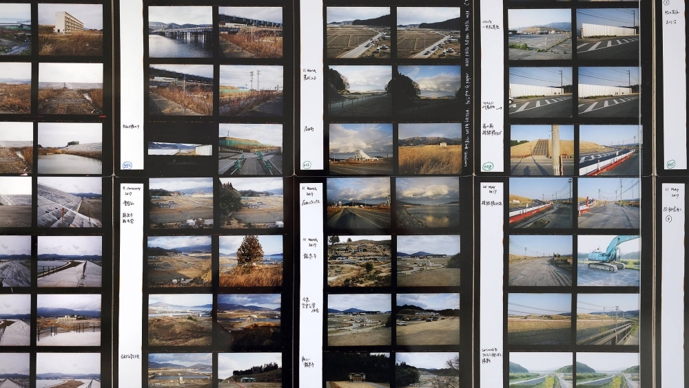 Naoya Hatakeyama’s “Rikuzen Takata 2011-2023” is a display of hundreds of color contact prints of his hometown, Rikuzen Takata, Iwate Prefecture. The images show the shifting landscape of a place that was heavily affected by the Great East Japan Earthquake in 2011.