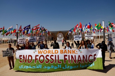Climate activists protest demanding that the World Bank stop fossil fuel financing on the first day of the annual meeting of the International Monetary Fund and the World Bank, in Marrakech, Morocco, on Monday