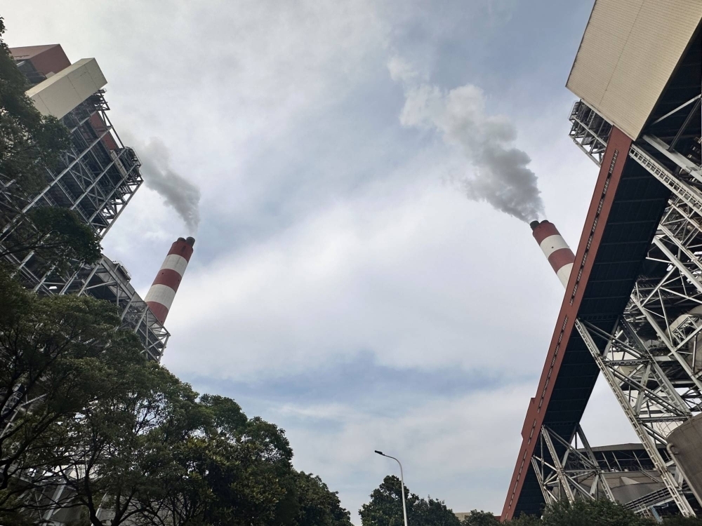 A power plant in Shanghai. Money matters when it comes to climate lawsuits — from the funding to cover costs in often lengthy legal processes, to potential payouts that could reach into the billions of dollars.