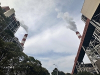 A power plant in Shanghai. Money matters when it comes to climate lawsuits — from the funding to cover costs in often lengthy legal processes, to potential payouts that could reach into the billions of dollars. | Bloomberg