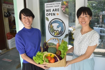 Asuka (left) and Mai Hatta. Their business, Hasora, near New Delhi, as partnered up with local organic vegetable farmers to sell fresh produce.