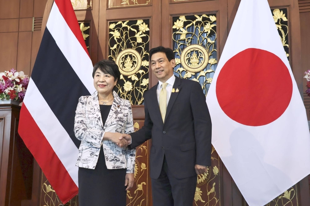 Foreign Minister Yoko Kamikawa meets with her Thai counterpart, Parnpree Bahiddha-nukara, in Bangkok on Thursday.