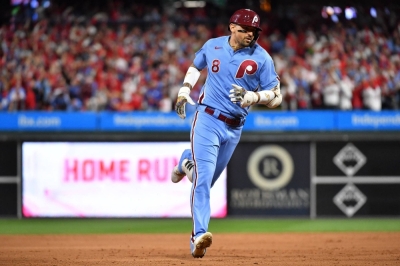 The Phillies' Nick Castellanos rounds the bases after hitting his second home run against the Braves in Game 4 of the NLDS in Philadelphia on Thursday.