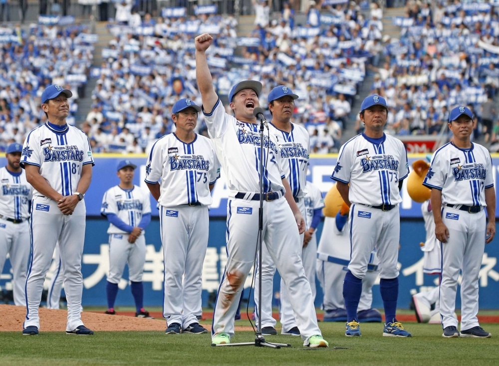 The BayStars' Shugo Maki addresses the crowd after the team's final home game of the regular season.