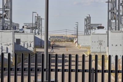 A portion of a Microsoft data center that supports the Pentagon, and is next door to a bitcoin mine operated by Chinese-owned Bit Origin, in Cheyenne, Wyoming, on Sept. 29. Aside from the intelligence-gathering concerns over Chinese bitcoin mines in the U.S., the energy sucking facilities can also put immense pressure on power grids.  