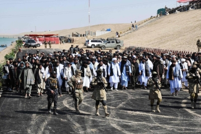 The senior leadership of the Taliban government arrives at an inauguration event for a canal project in Hairatan, Afghanistan, on Wednesday.