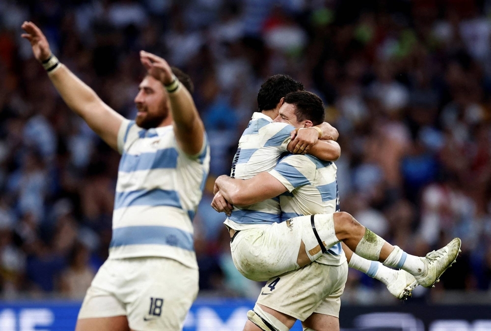 Argentina players celebrate after their 2023 Rugby World Cup quarterfinal win over Wales in Marseille, France, on Saturday.