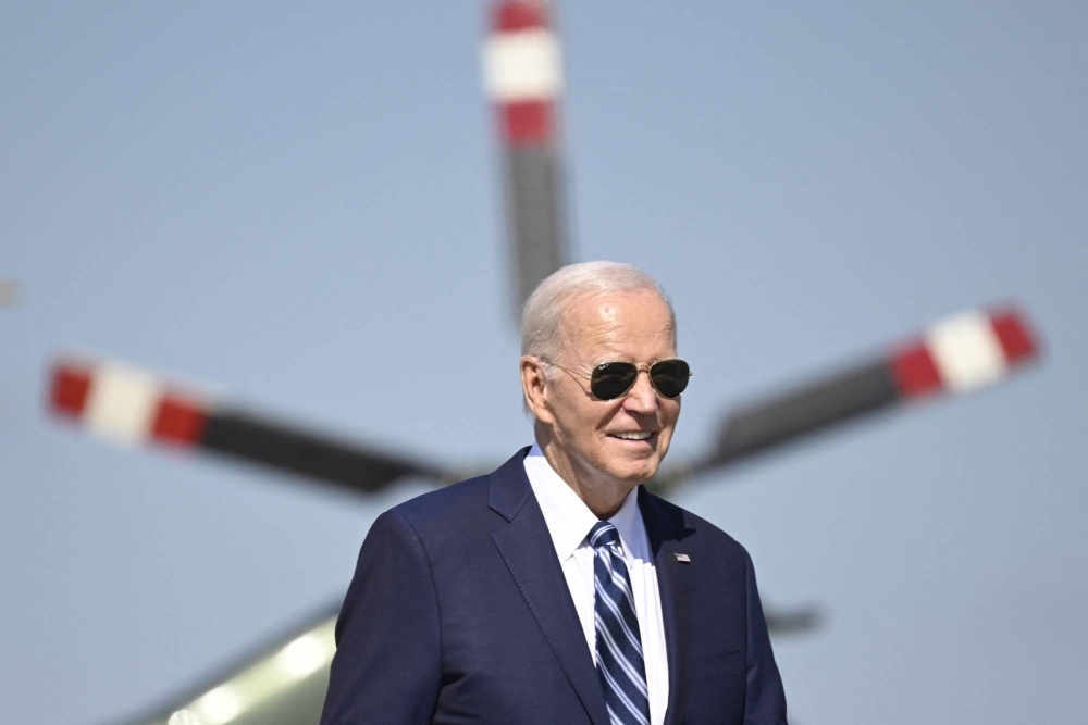 U.S. President Joe Biden arrives to board Air Force One at Joint Base Andrews in Maryland on Friday.