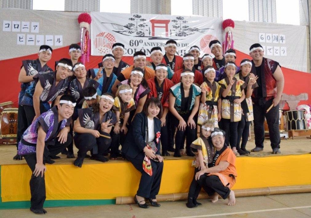 Aiko Taniguchi (front row, center) visits Colonia Pinhal, a settlement in Sao Paulo, for the first time in 11 years and participates in a ceremony marking the 60th anniversary of its opening, in August.