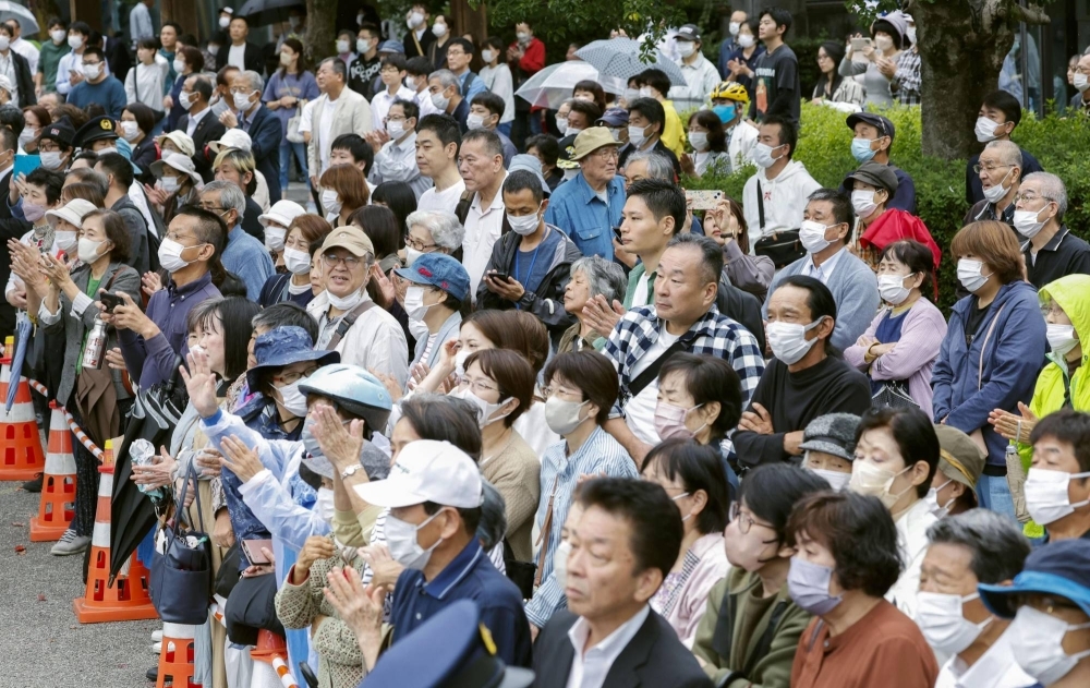 Voters listen to a speech by a candidate in the Tokushima-Kochi Upper House district in the city of Kochi on Saturday.