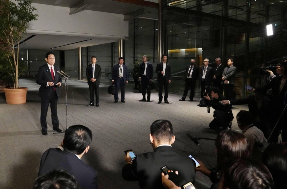 Prime Minister Fumio Kishida speaks to reporters at the Prime Minister's Office on Tuesday.