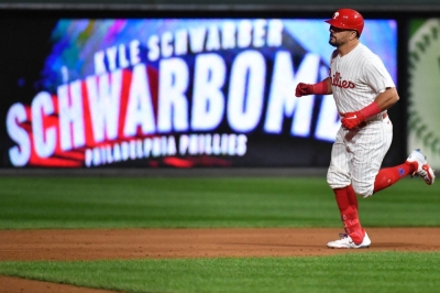 Phillies left fielder Kyle Schwarber rounds the bases after his sixth-inning home run against the Diamondbacks during Game 2 of the NLCS in Philadelphia on Tuesday.