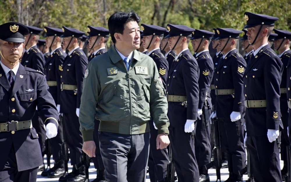 Defense Minister Minoru Kihara visits Ground Self-Defense Force troops at Camp Asaka, which straddles Tokyo and Saitama Prefecture, on Tuesday.