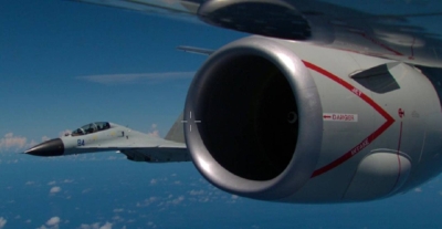 A Chinese fighter jet is seen during an intercept of a U.S. aircraft in the South China Sea, including by approaching a distance of just 12 meters before repeatedly flying above and below the U.S. aircraft and flashing its weapons. 