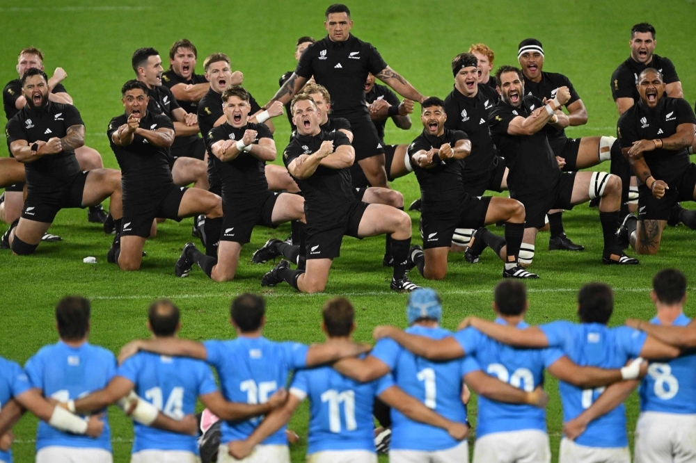 The All Blacks perform the haka before their World Cup match against Uruguay in Lyon, France, on Oct. 5