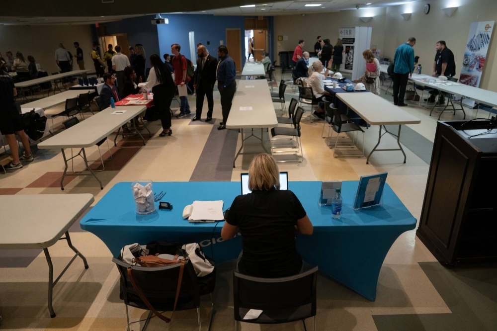 Jobseekers attend a Business and IT Career Fair at Cape Fear Community College in Castle Hayne, North Carolina, on Sept. 20.