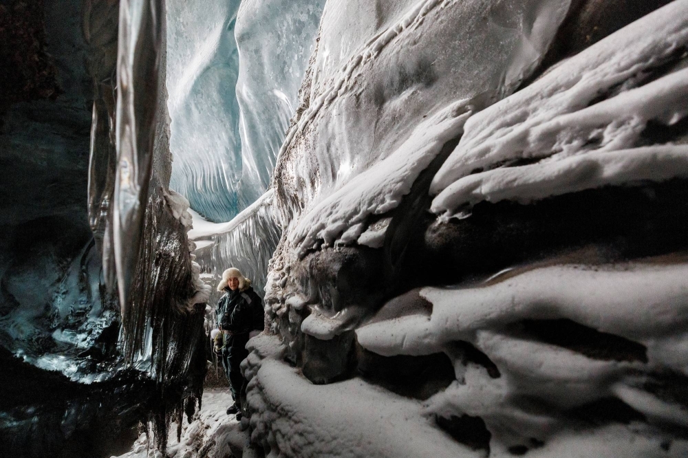 Ice walls inside a glacier cave in Svalbard, Norway