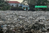 Plastic waste in Yangon's Shwepyithar township. In a working-class neighborhood of Myanmar's Yangon, plastic waste is piled a meter high, the toxic product of what a recent investigation says is rampant dumping of Western trash.  | AFP-Jiji